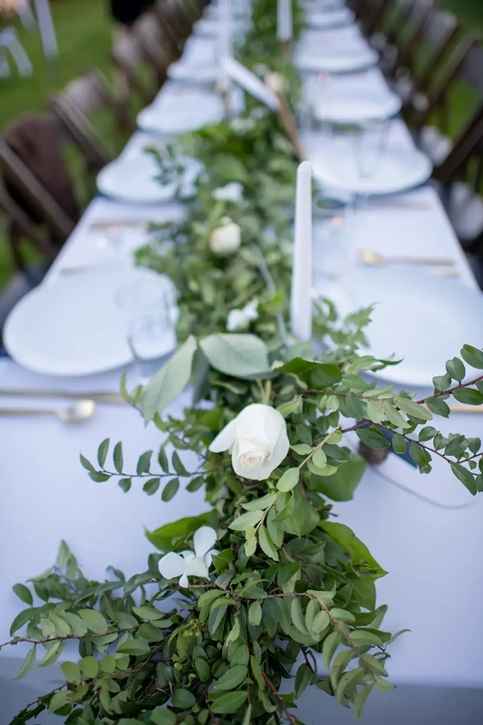 the reception table plated decorated and ready for dinner at A ​Sauvie Island Wedding from Photographer ​Robert Knapp 