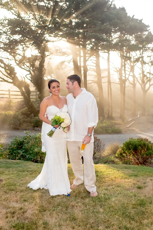 Wedding on the Beach
Cannon Beach Wedding
Photographer Robert Knapp Interesting amber light from the sunset, fog and trees, the bride and groom look to each other fondly