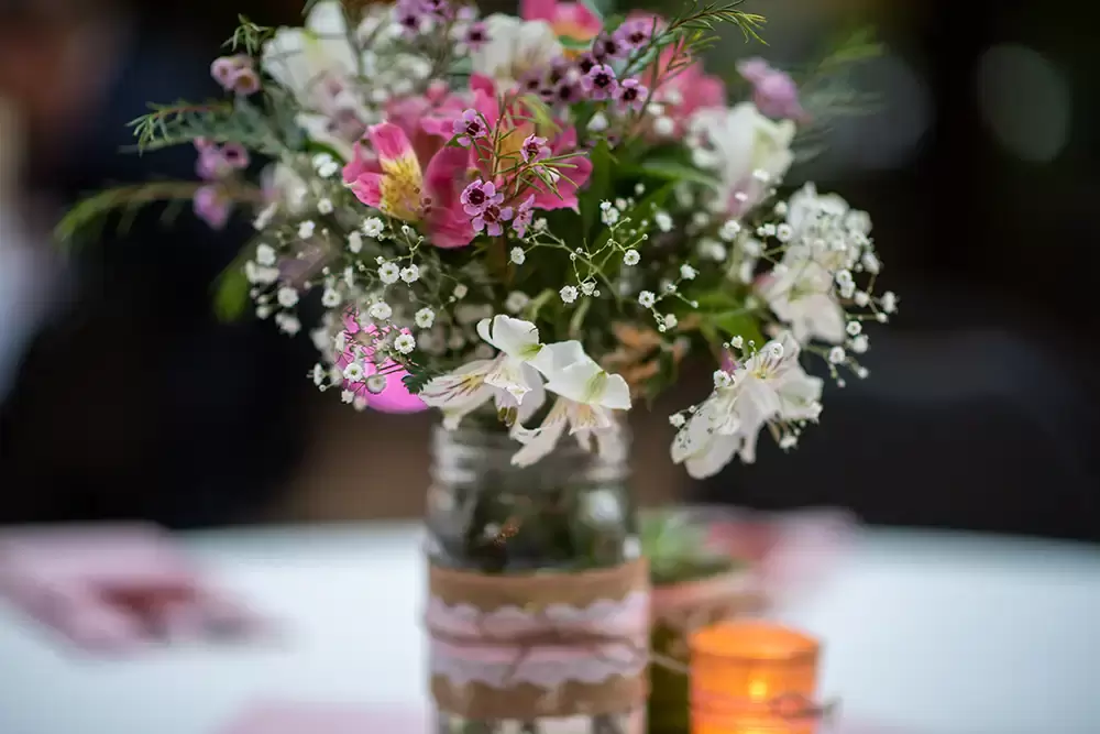 Cornelius Pass Roadhouse McMenamins Wedding With Photographer Robert Knapp flowers for table decor 