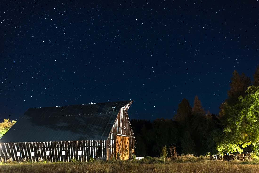 Tin Roof Weddings Barn Weddings Venues Near Me from Photographer Robert Knapp A long exposure of the party, The stars are many in the sky, light from the party shines through the barn everywhere. Tin Roof Weddings Barn Weddings Venues Near Me