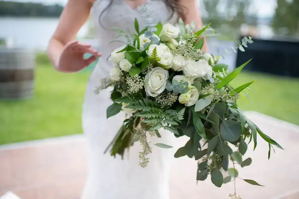 bride holds a her bouquet at A ​Sauvie Island Wedding from Photographer ​Robert Knapp 