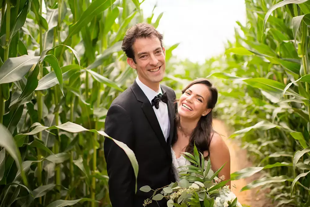 in a corn field with the bride and groom at a A ​Sauvie Island Wedding from Photographer ​Robert Knapp 