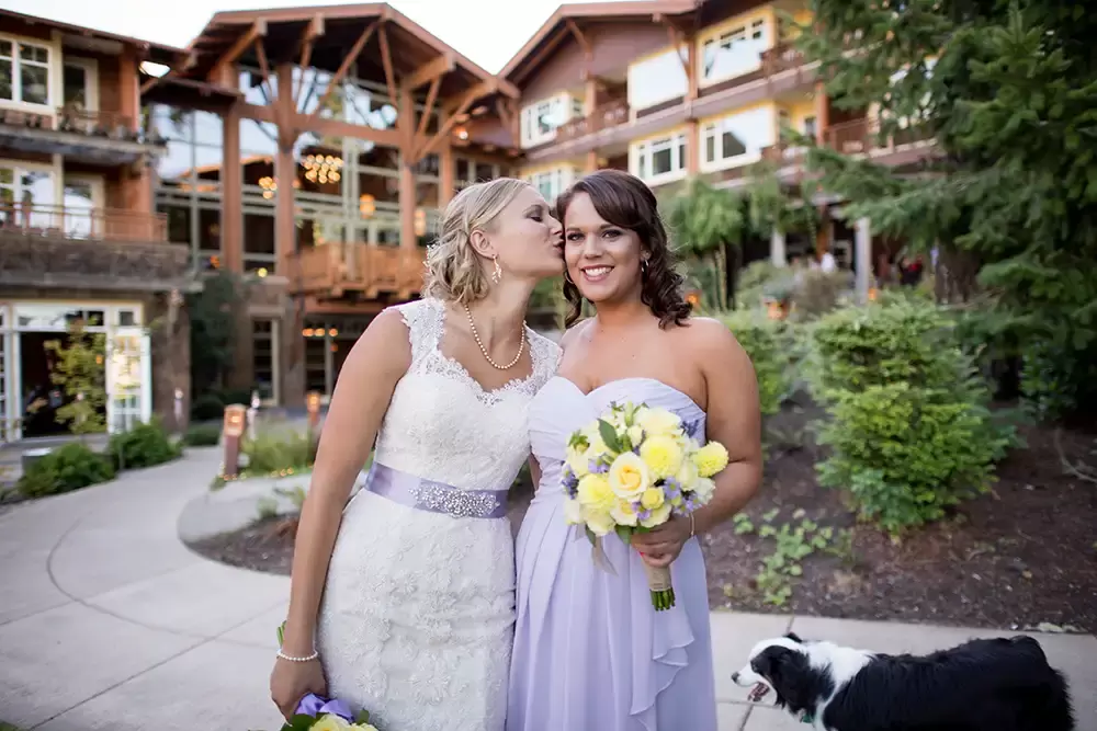 Alderbrook Resort Weddings
from ​Photographer Robert Knapp Bride kisses bridesmaid on the cheek