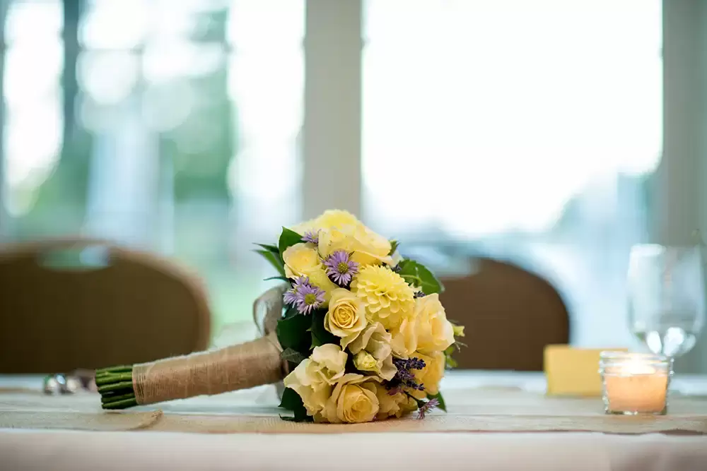 Alderbrook Resort Weddings
from ​Photographer Robert Knapp The brides bouquet lays on the table. It is no longer needed.