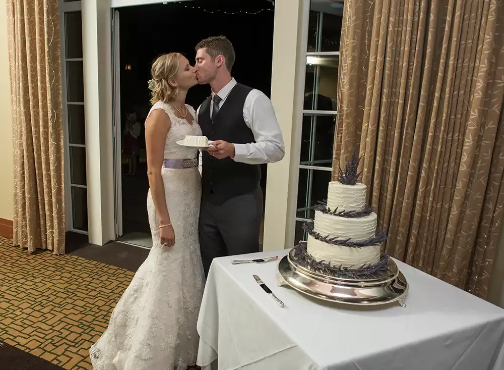 Alderbrook Resort Weddings
from ​Photographer Robert Knapp Bride and groom cut the cake now they kiss