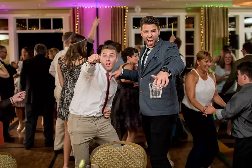 Alderbrook Resort Weddings
from ​Photographer Robert Knapp Wedding guests dancing drinking. I'm looking to the camera. They are very happy.