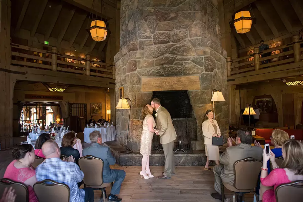 
Wedding at Timberline Lodge, the bride and groom kiss at the end of the ceremony