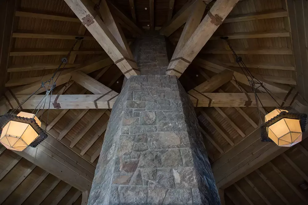 Wedding at Timberline Lodge ​from photographer Robert Knapp A stone chimney supports the timbers that hold the building in the rafters. Breathtaking Photography from
a
Wedding at Timberline Lodge