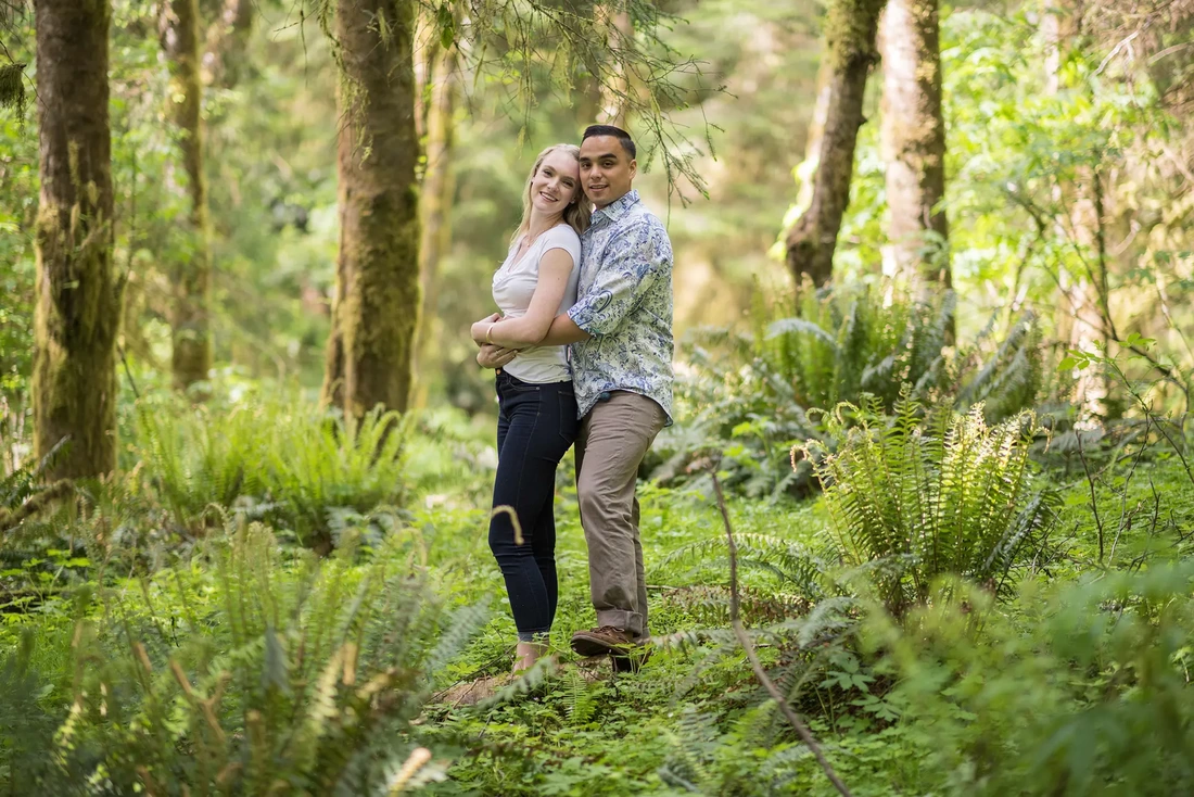 Cannon Beach Engagement Photos, A Couple holding each other in the woods at Ecola State Park in Cannon Beach