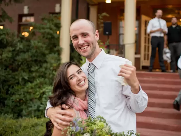 ​McMenamins Grand Lodge Weddings  from Robert Knapp PhotographerA happy couple of guests hold each other during the reception at 