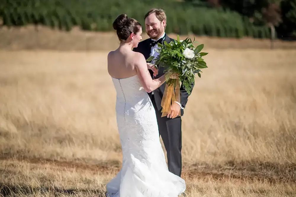Farm Wedding Oregon
Rustic ​Chic Style with Robert Knapp Photographer the happy couple talk and have a private moment together for the first time on the wedding day. 