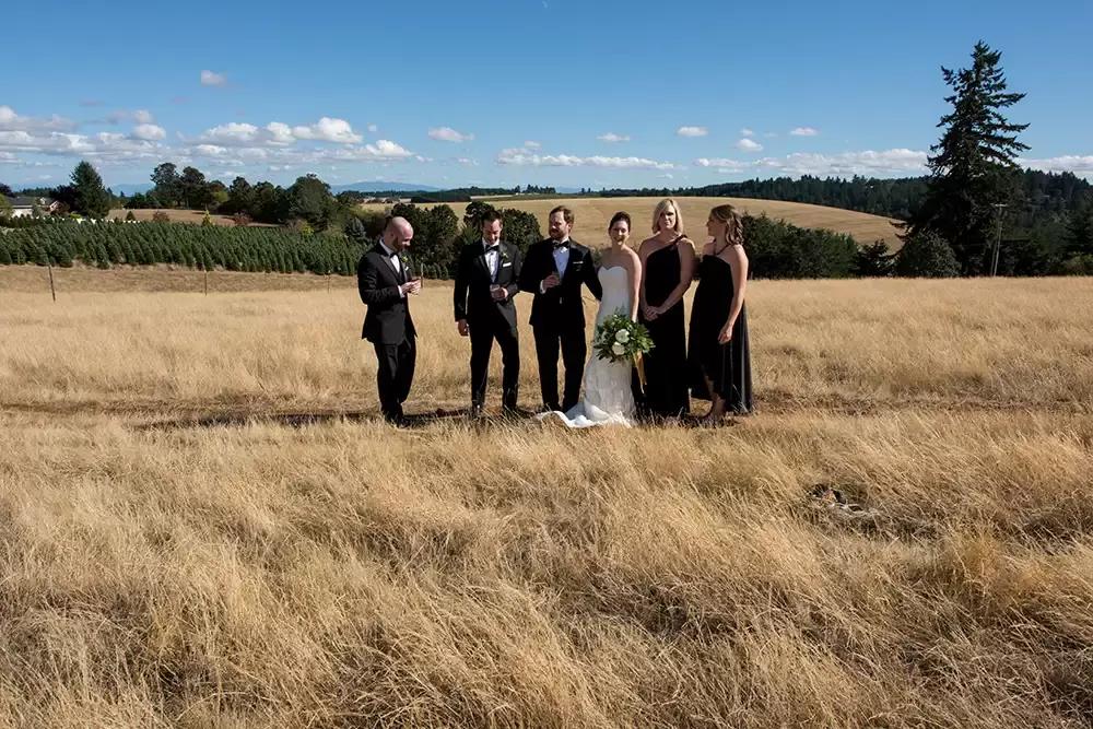Farm Wedding Oregon
Rustic ​Chic Style with Robert Knapp Photographer The wedding party gathers for a portrait. The coming together of the portrait is more interesting to me than the portrait of everyone smiling at the camera. 