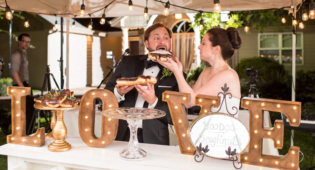 Farm Wedding Oregon Rustic ​Chic Style with Robert Knapp Photographer Instead of cake the bride and groom feed each other bites of Giant doughnuts. 