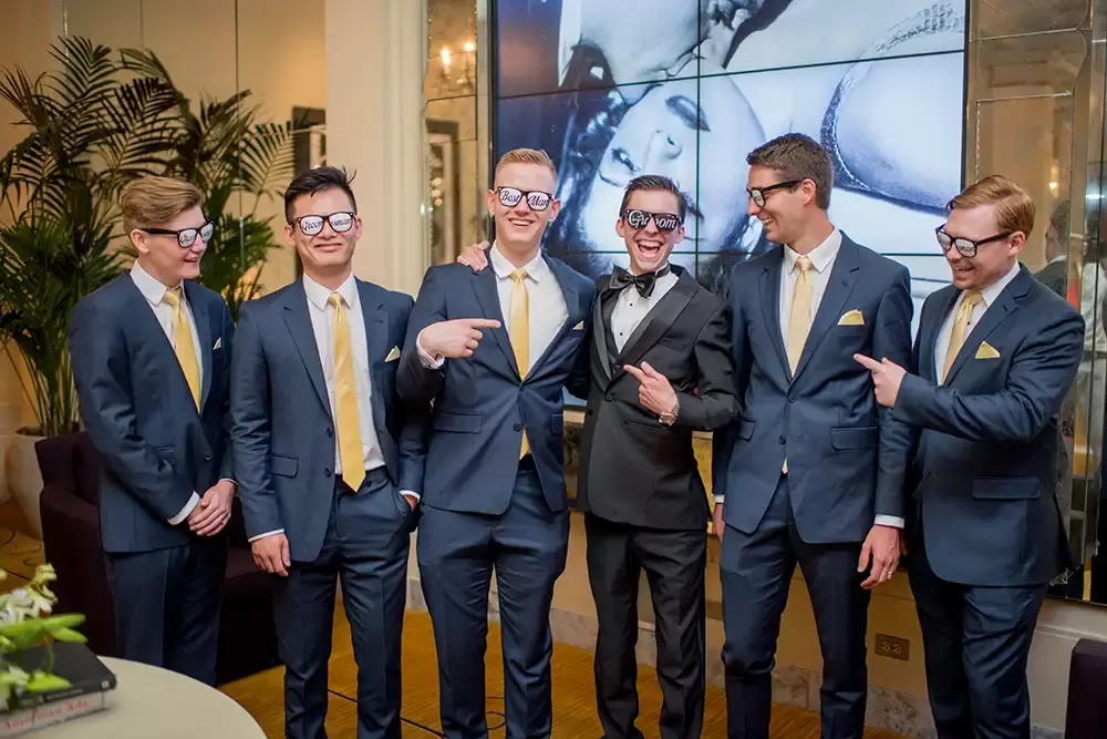 Hotel Deluxe Wedding in Portland Oregon
by Photographer Robert Knapp groomsmen in the lobby of the hotel with fun sunglasses on