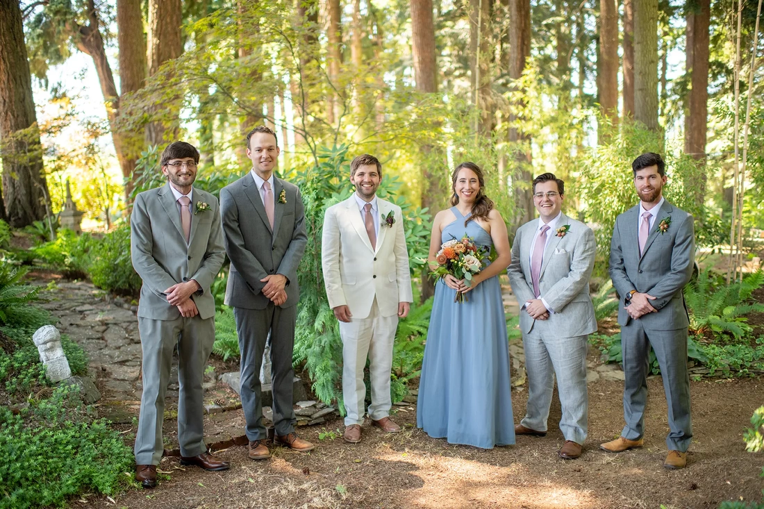 groom poses with groomsmen and women Millers Farm Weddings, Photography from Modern Art Photograph