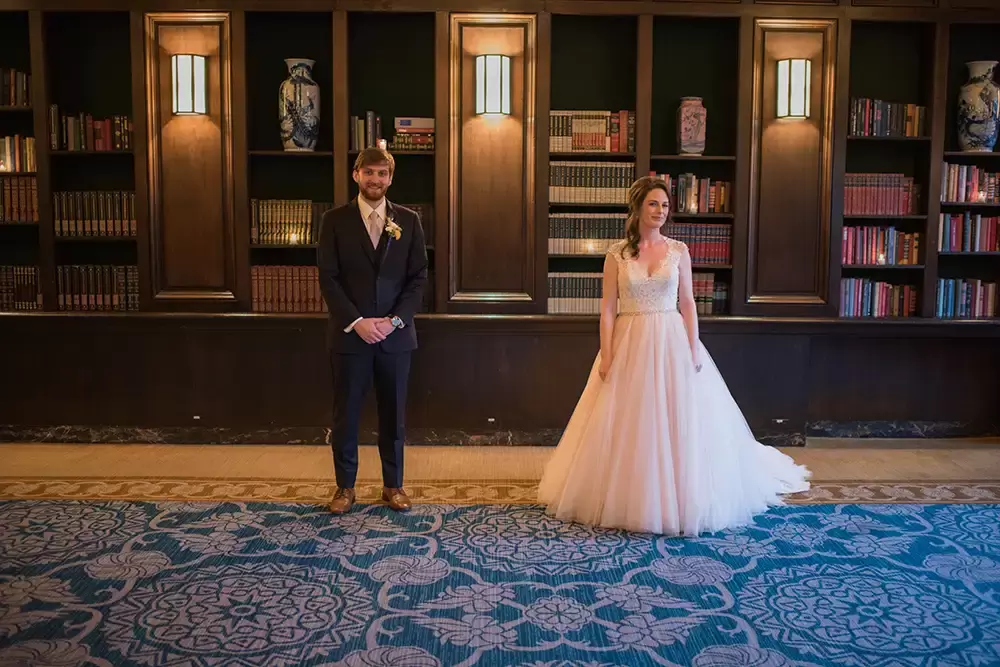 library photos with the bride and groom as photographed by ​​Modern Art Photograph 
Wedding Photographers in Portland
on location at the 
Portland Sentinel Hotel