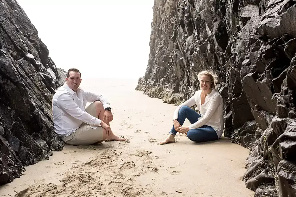 a sea cave makes an interesting location for a photo Oregon Coast Engagement Photos 
With 
Modern Art Photograph