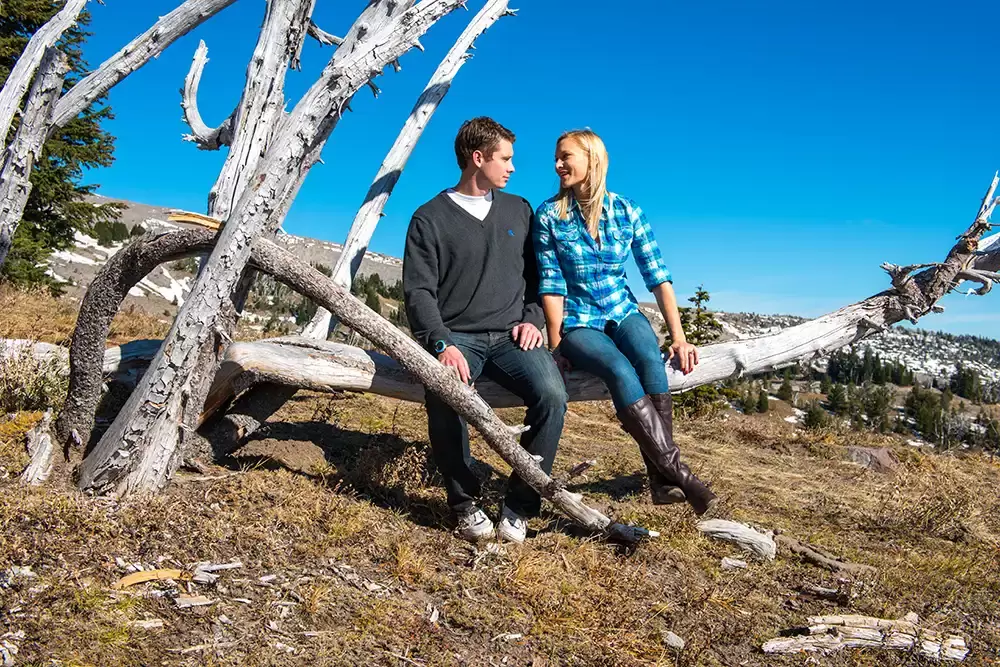 mountain engagement photos, a couple sits on a log as we shoot the photos for the engagement. Unforgettable Moment - Mountain Engagement Photos 
with
​ Photojournalist Photographer Robert Knapp