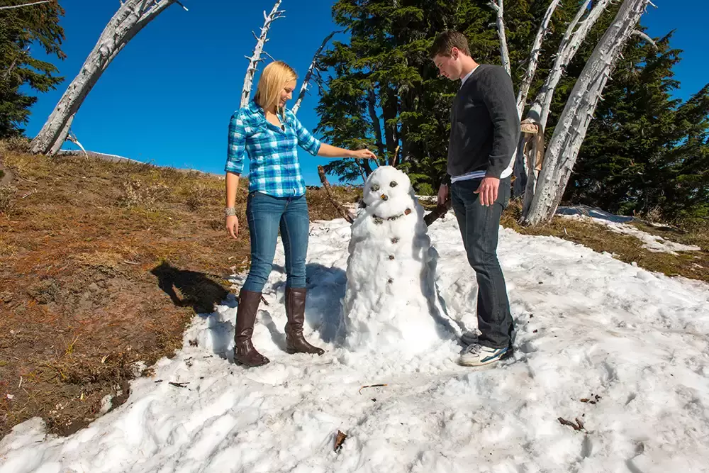 building a snow man mountain engagement photos Unforgettable Moment - Mountain Engagement Photos 
with
​ Photojournalist Photographer Robert Knapp
