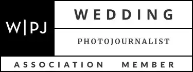 Portland Wedding Photographer Robert Knapp displays his Wedding Photojournalist Association Membership