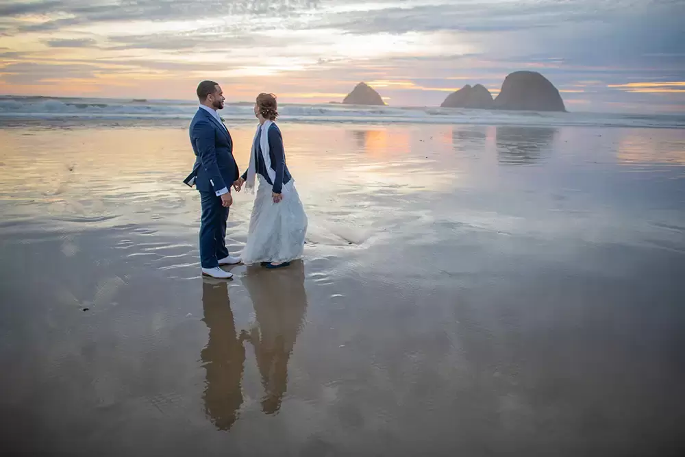 Wedding Photographers Near Me | Modern Art Photograph
Wedding Photography
from Oceanside, Oregon bride looks to the sunset on the beach after her wedding with the the groom