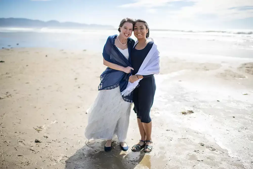 Wedding Photographers Near Me | Modern Art Photograph
Wedding Photography
from Oceanside, Oregon bride and one of the bridesmaids stand together. 