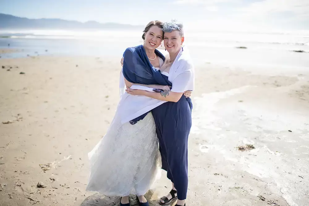 Wedding Photographers Near Me | Modern Art Photograph
Wedding Photography
from Oceanside, Oregon bride stands with a bridesmaid on the beach