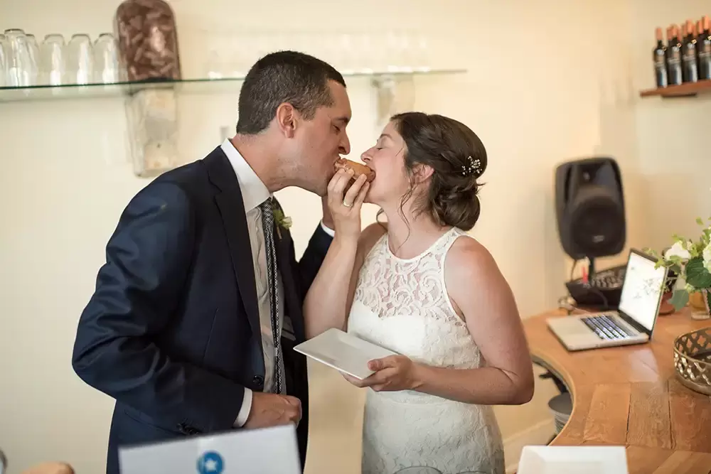 bride and groom share a piece of cake together. Wedding Photography from Opal 28
Robert Knapp photographer at Opal28