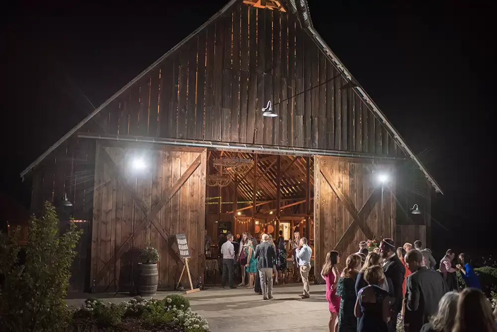 Tin Roof Weddings Barn Weddings Venues Near Me from Photographer Robert Knapp All the guests prepare to go back inside